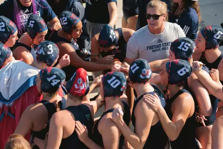 Fresno State water polo team huddle