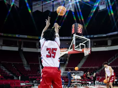 DeShawn Gory taking a three-point shot