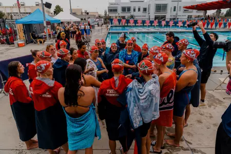 Swim team huddle