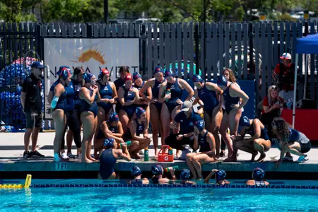 Water Polo team huddles