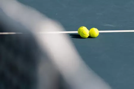 tennis balls on court
