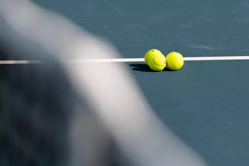 tennis balls on court
