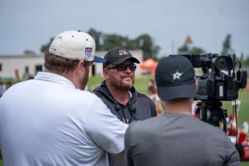 Matt Entz with media