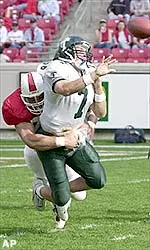 Michael Josiah delivers a hit on the Tulane quarterback.