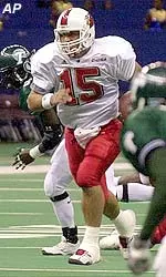 Quarterback Dave Ragone runs through the middle of the Tulane defense for a touchdown in the first half.