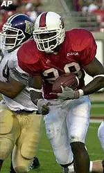 T.J. Patterson outruns the pursuit of Western Carolina's John Brashear.