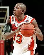 Erik Brown  nets 17 points to lead Louisville against DePaul, Saturday.