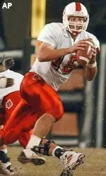 Dave Ragone rolls out in the first quarter against Southern Miss.
