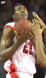 Marvin Stone goes up for a shot against the Manhattan defense during the first half of the championship game in the Billy Minardi Classic.