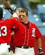 Senior third baseman Mike Budak is congratulated by Dave Williams Jr. after the first of his two home runs in U of L's 7-1 win Sunday.