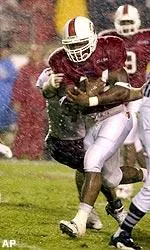 Henry Miller breaks a tackle and scores the winning touchdown in overtime.