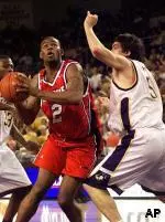Ellis Myles tries to drive the ball around East Carolina's Gabriel Mikulas in the Cards' win