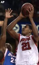 Marvin Stone puts a shot up over the defense of DePaul's Sam Hoskin during Louisville's 71-43 victory Wednesday.