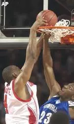 Nouha Diakite goes up for a dunk against Seton Hall's Damion Fray during the first half.