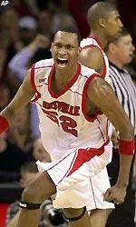 Otis George, who scored 14 points, celebrates after hitting a dunk shot during the second half.