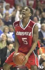 Taquan Dean prepares to launch the ball into the air as the final horn sounds on the Cards' 78-75 win over Memphis in the Conference USA semifinals Friday