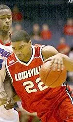 Reece Gaines drives on DePaul's LeVar Seals during the first half on Wednesday
