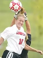 Freshman Amy Seng battles the Butler goalkeeper Sunday in the Cardinals scoreless tie.