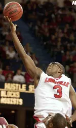 Juan Palacios scores two of his game-high 25 points during the second half Tuesday in Louisville.