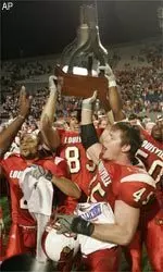 Louisville players celebrate their 44-40 win over Boise State.