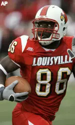Louisville's Montrell Jones looks over his shoulder as he runs to the end zone on a 60 yard pass from quarterback Brian Brohm during the first half of their game against Syracuse Saturday, Nov. 26, 2005, in Louisville, Ky. (AP Photo/Ed Reinke)
