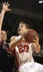 Will Scott drives to the basket against Bellarmine's Matt Otte.