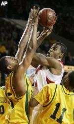Terrence Williams shoots in traffic during the first half of Louisville's 76-63 win over San Francisco. (AP Photo/Ed Reinke)