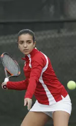 Gorbea battled to a three-set win and won doubles as well.