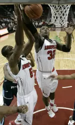 Derrick Caracter grabs a rebound during the first half. (AP)