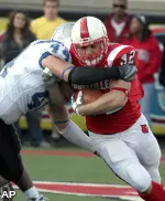 Brock Bolen runs though a tackle attempt by Middle Tennessee's Danny Carmichael to score from three yards out. (AP)