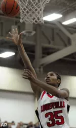 McCoughtry scores 2 of her 15 points on this layup during the first half.