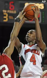 Gwen Rucker shoots over a Hartford defender. (AP Photo/Timothy D. Easley)