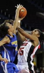 Angel McCoughtry, right, shoots over Morehead State's Brittany Pittman