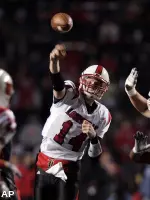 Louisville quarterback Hunter Cantwell (14) throws a pass. (AP)