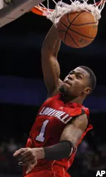 Terrence Williams dunks the ball for two of his team-high 22 points during the second half. (AP Photo/Jerry Lai)