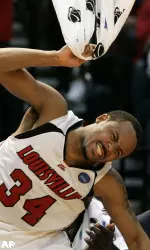 Louisville guard Jerry Smith celebrates in the second half. (AP Photo/Wilfredo Lee)