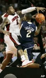 Terrence Williams (1) defends against Notre Dame's Tory Jackson.