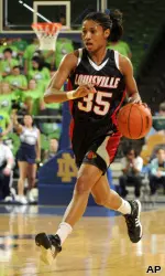 Guard Angel McCoughtry heads upcourt during the first half.