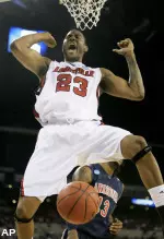 Louisville's Terrence Jennings celebrates after a dunk. (AP)