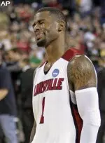 Terrence Williams walks off the floor in his final game as a Cardinal.