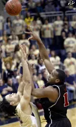 Samardo Samuels, right scores over Pittsburgh's Gary McGhee in the second half.(AP Photo/Keith Srakocic)
