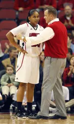 Head coach Jeff Walz and Monique Reid