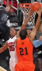 Wayne Blackshear blocks a shot in the Cardinals' exhibition game against Pikeville on Wednesday.
