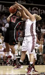 Louisville guard Bria Smith puts up a shot.