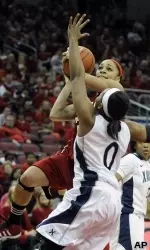 Bria Smith puts up a shot over the defense.