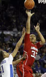 Monique Reid shoots under pressure from Kentucky's A'dia Mathies. Reid scored nine points for the Cardinals.