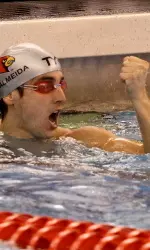 Carlos Almeida set a school record in the 200-IM.