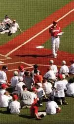 Coach Dan McDonnell talks to campers at Patterson Stadium.