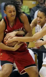 Cortnee Walton battles for control of a loose ball. (AP Photo/David Zalubowski)