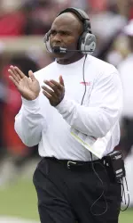 Head coach Charlie Strong guided Louisville to its third BIG EAST title.